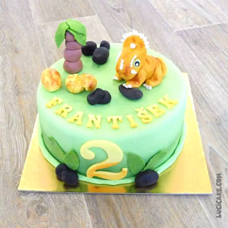 malý dinosaurus na dortu
